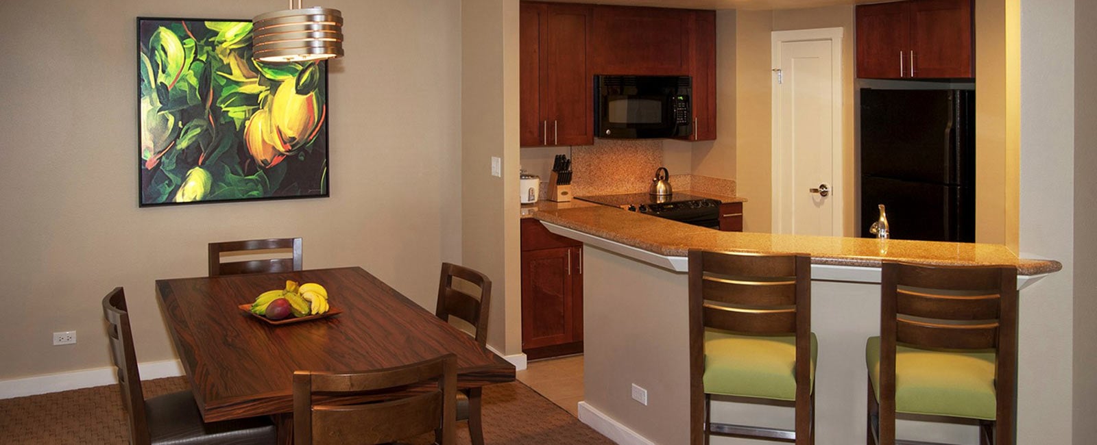 Dining Area and Kitchen at Lagoon Tower in Honolulu, Hawaii